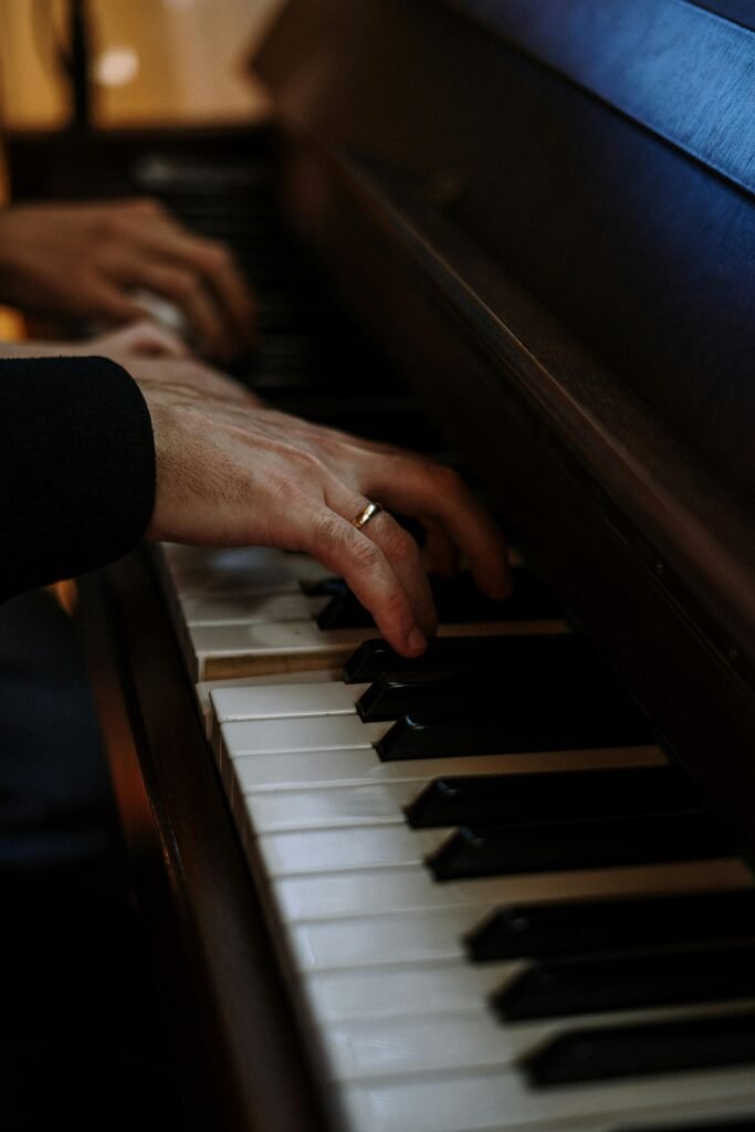 pexels-photo-4088819-4088819 Hands of an adult male playing the piano at piano lessons