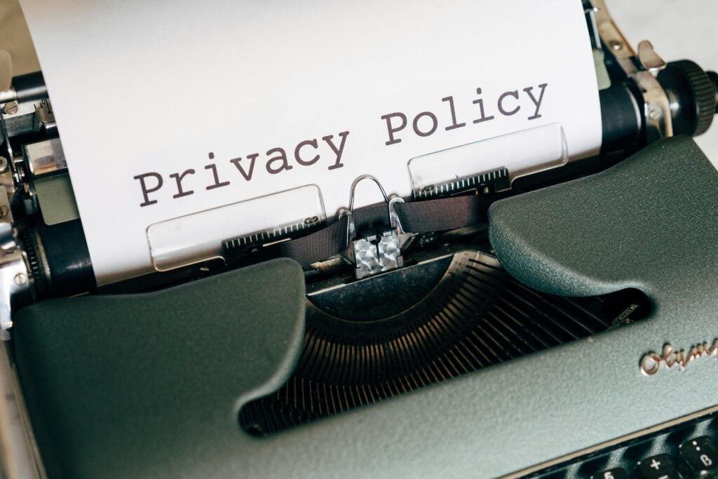 pexels-photo-4160125-4160125 Close-up of a vintage typewriter featuring a privacy policy document in focus, highlighting classic technology.